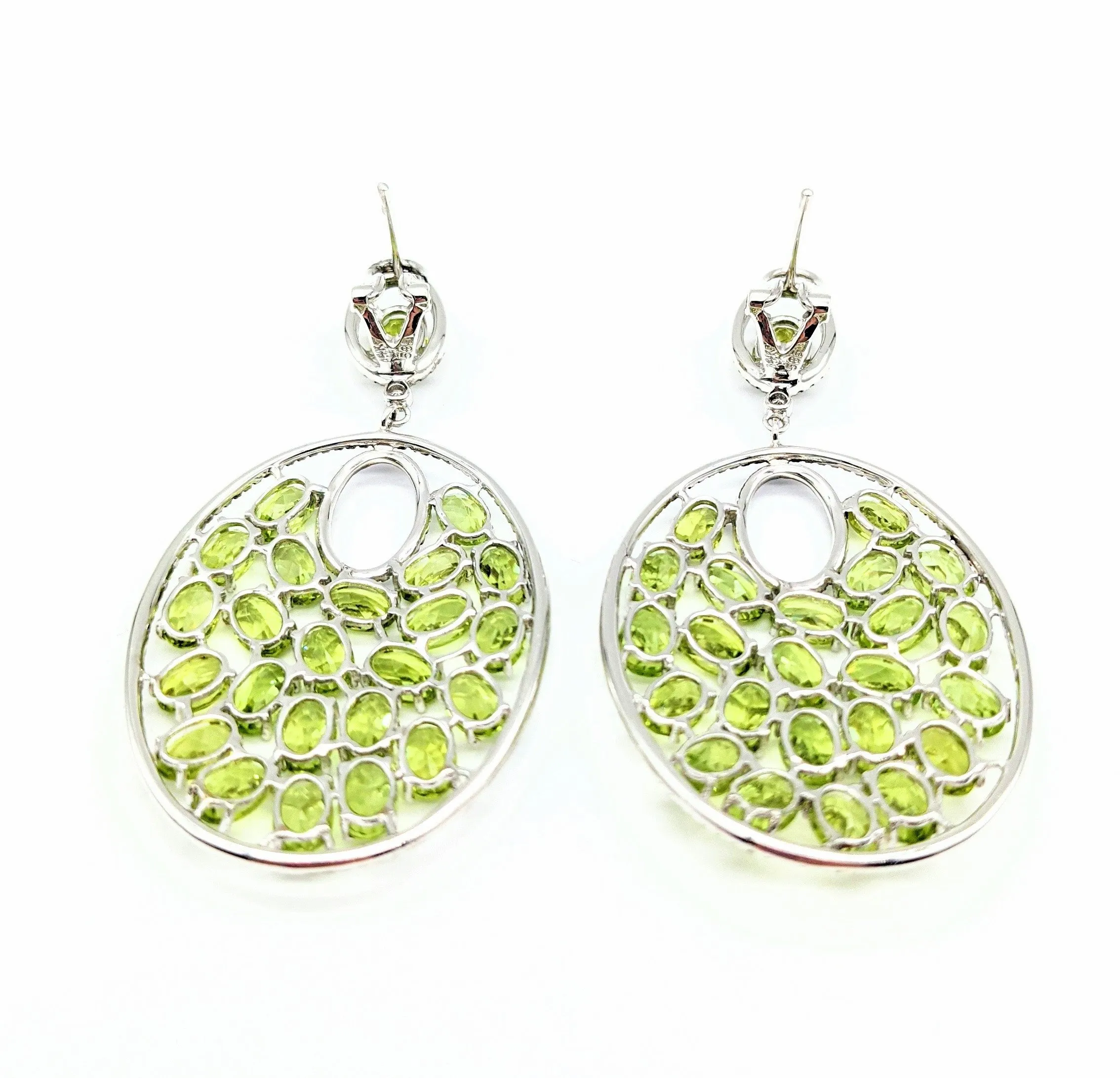 1.07 carat total weight diamond and peridot dangled earrings