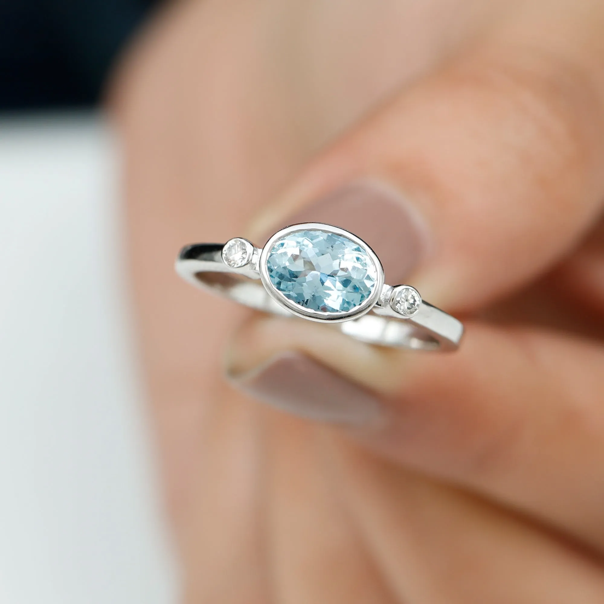 Bezel Set Aquamarine and Diamond East West Engagement Ring