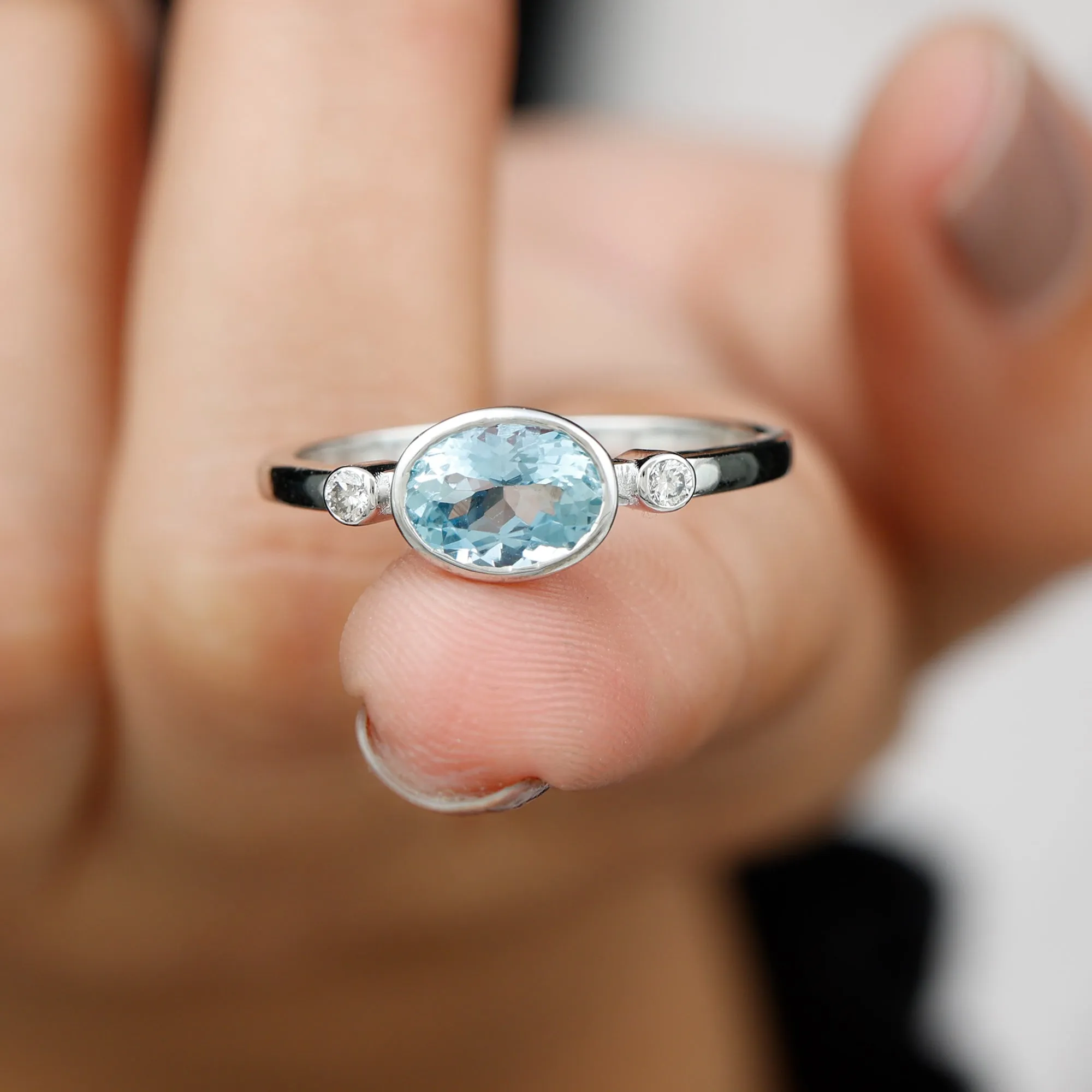 Bezel Set Aquamarine and Diamond East West Engagement Ring