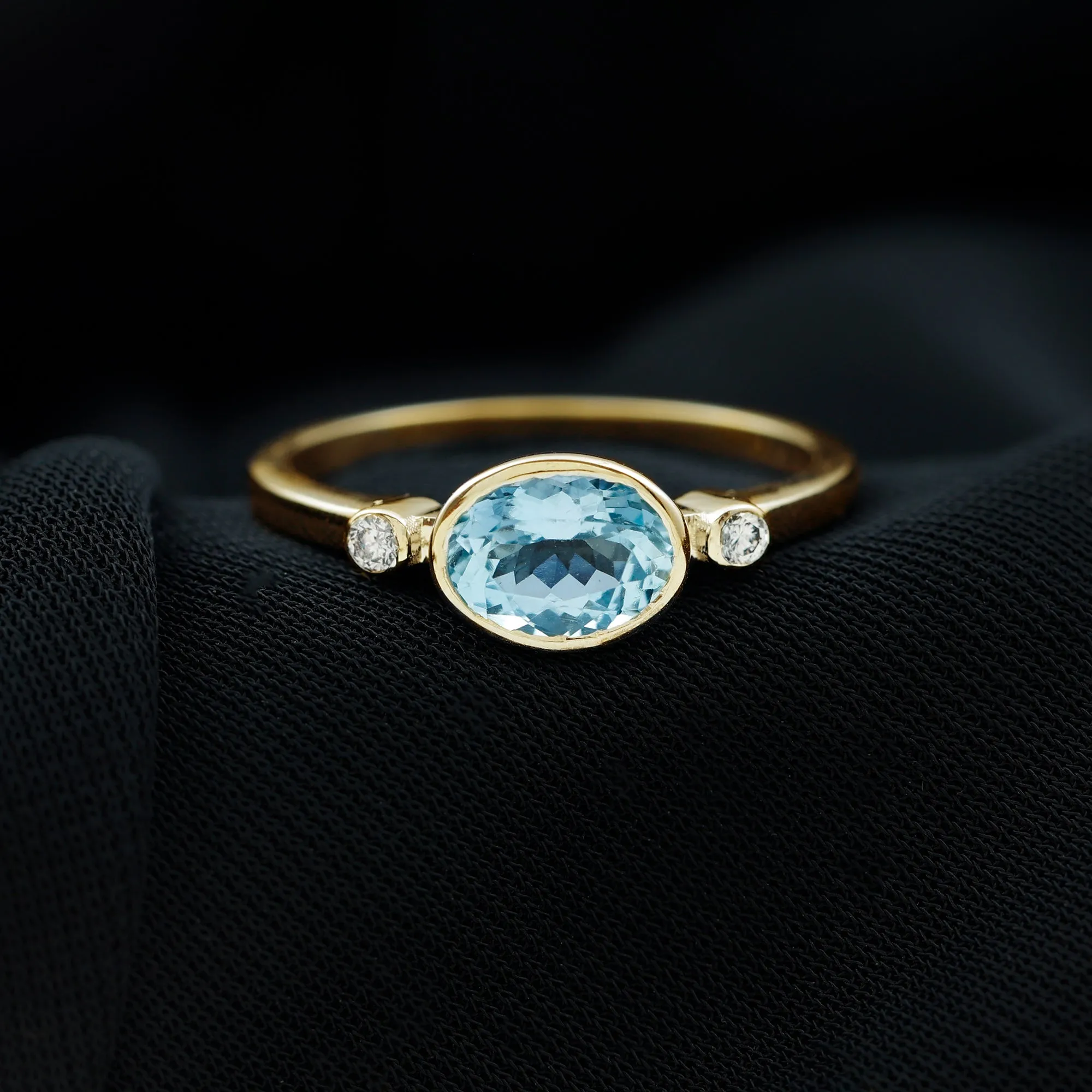 Bezel Set Aquamarine and Diamond East West Engagement Ring