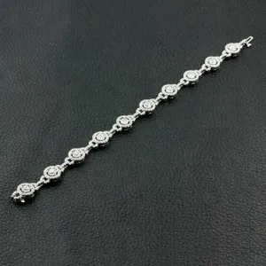 Diamond Bracelet with Round Motif Links