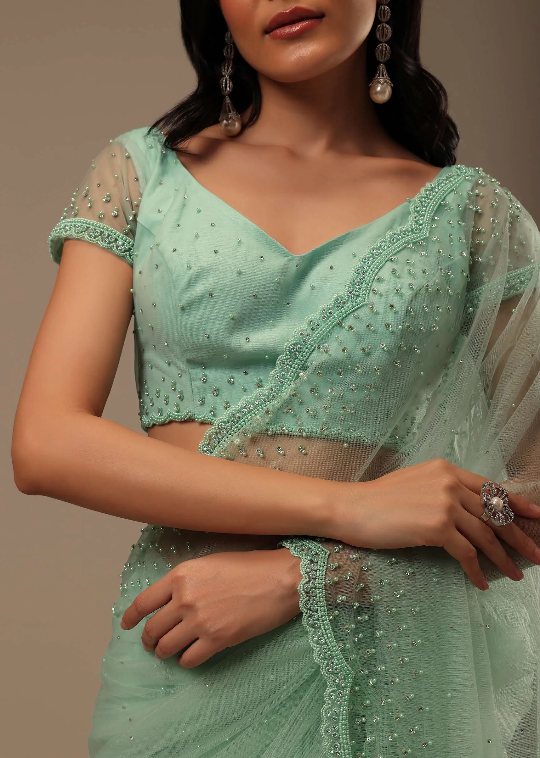 Light Green Stone And Beads Embellished Net Saree