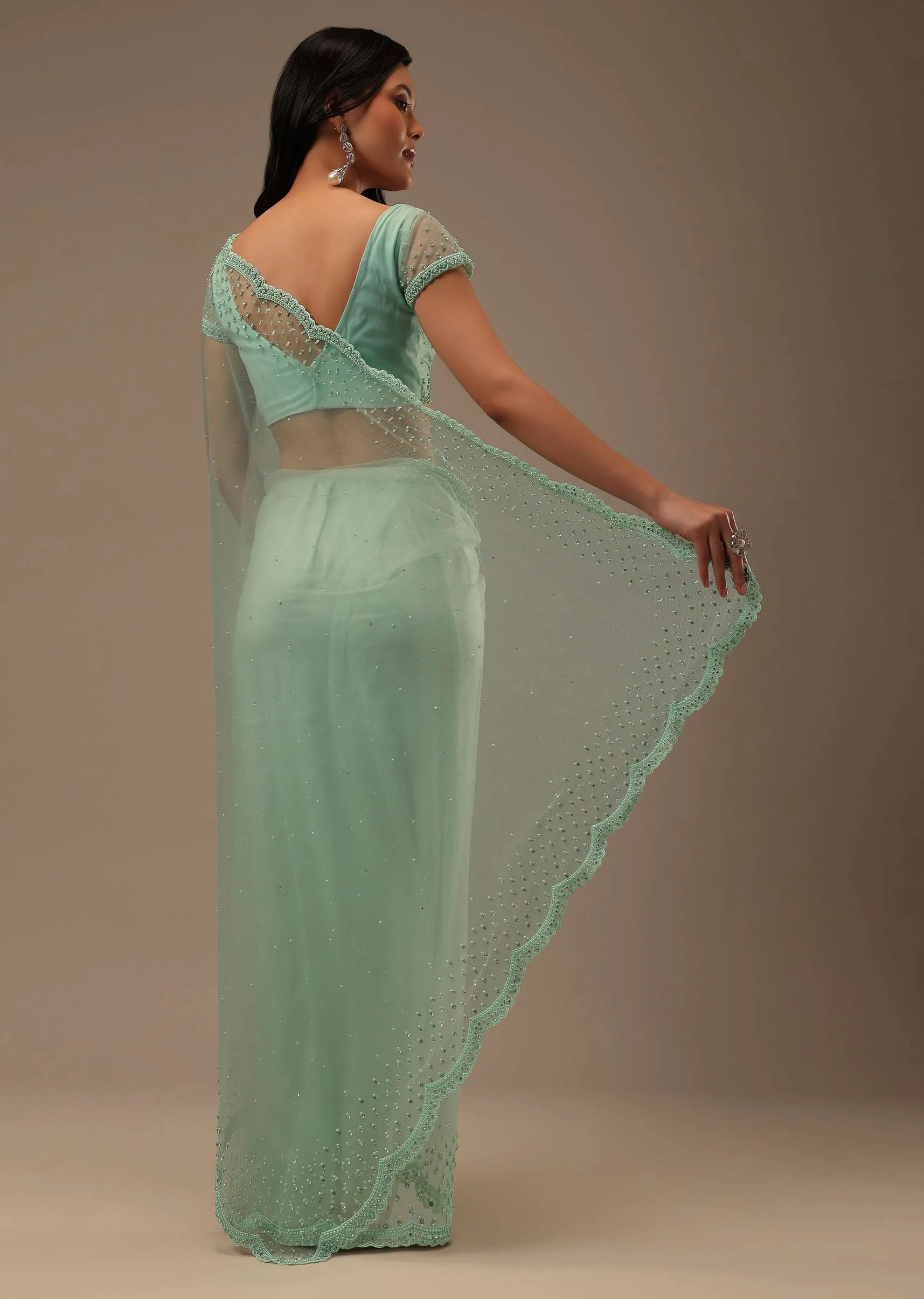 Light Green Stone And Beads Embellished Net Saree