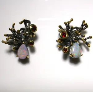 Pink and green solid boulder opals and garnets set in sterling silver stud earrings
