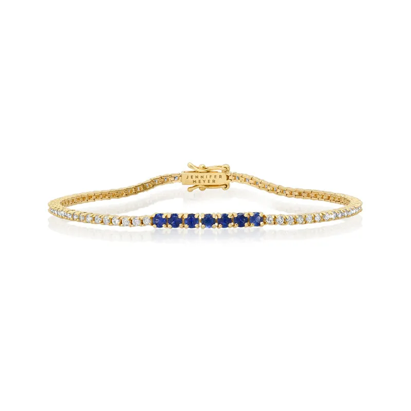 Small 4-Prong Diamond Tennis Bracelet with Large Blue Sapphire Accent